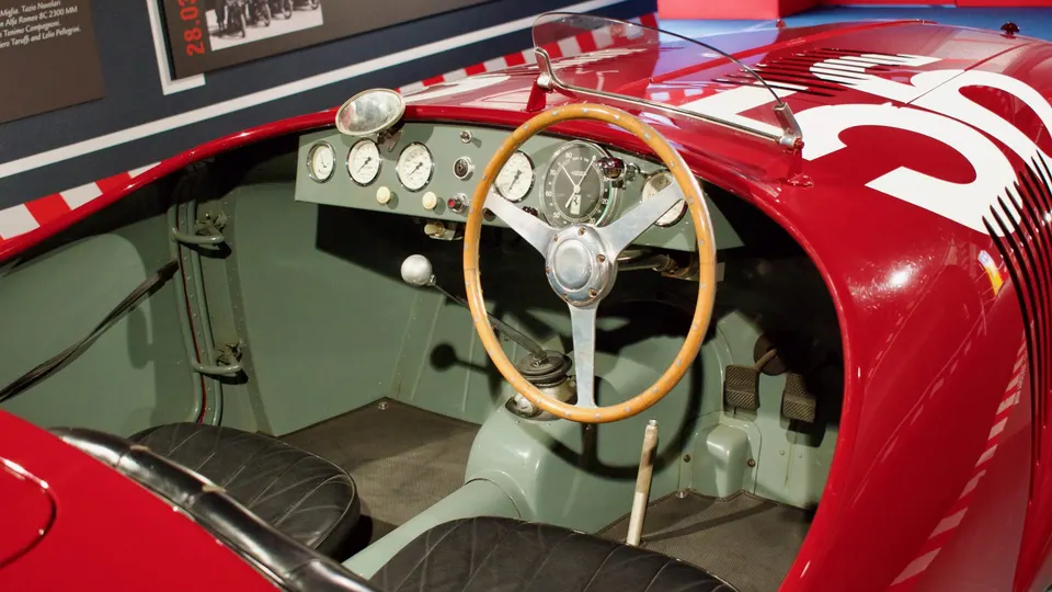 Racing car cockpit with a wooden steering wheel